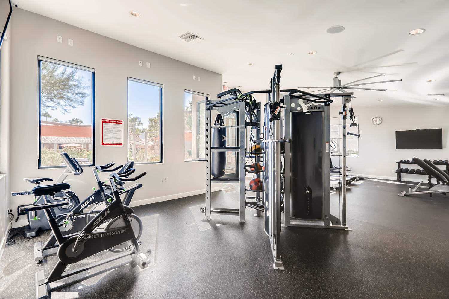 Fitness center with cardio and strength training equipment